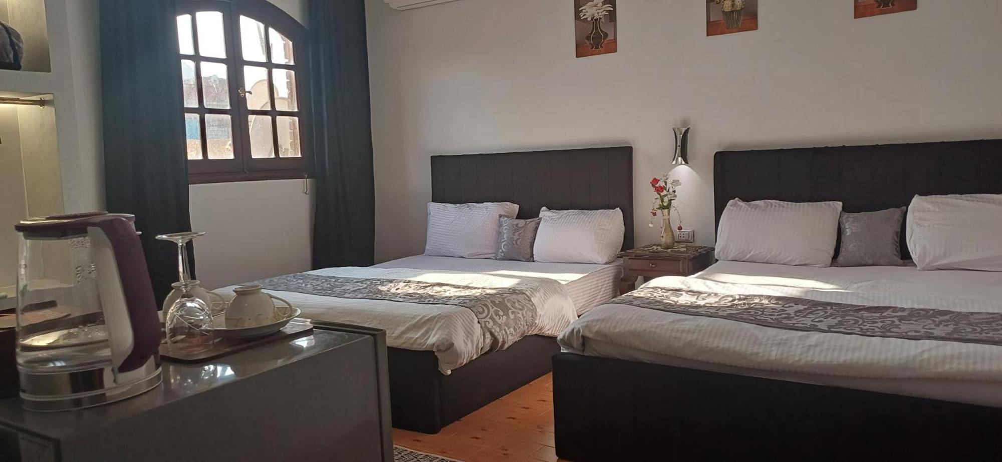 Pyramids Kingdom - Guest House Kafrat al Jabal ภายนอก รูปภาพ
