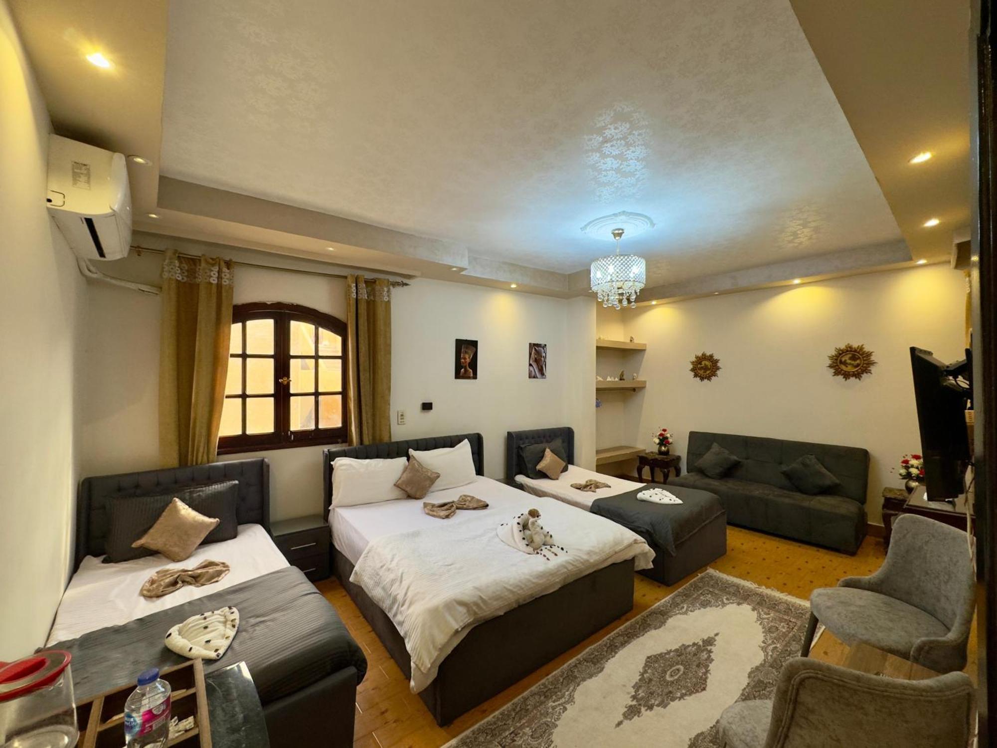 Pyramids Kingdom - Guest House Kafrat al Jabal ภายนอก รูปภาพ