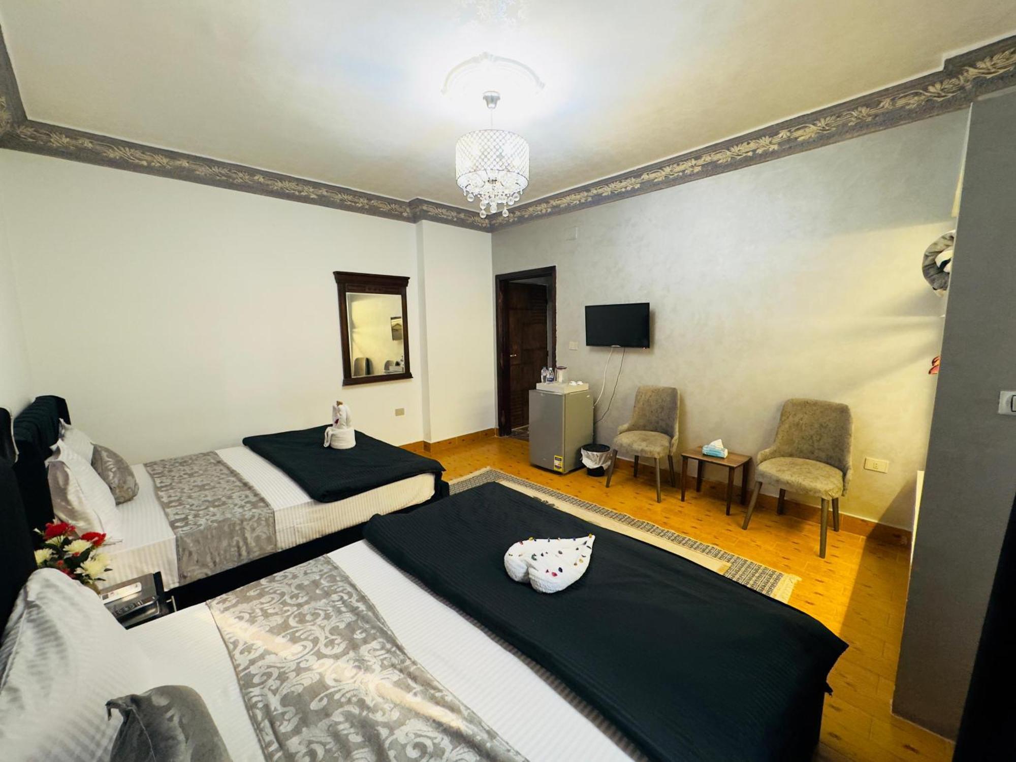 Pyramids Kingdom - Guest House Kafrat al Jabal ภายนอก รูปภาพ